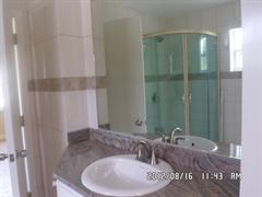 MODERN BATHROOMS WITH DOUBLE SINKS AND TUB