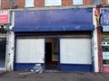 Retail Property To Let in To Let - Lock Up Shop, Green Lane, Dagenham, RM8 1XU