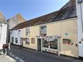 High Street Retail Property For Sale in 22 Fore Street, St Austell, Cornwall, PL26 6UQ